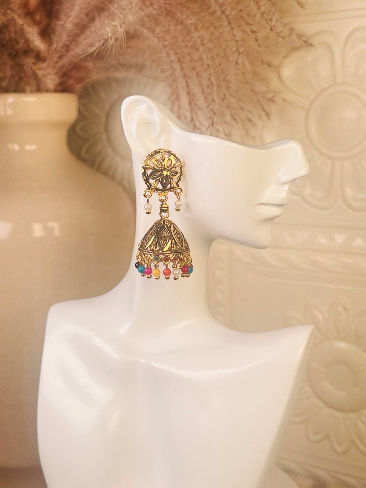 Kundan chandelier earrings – affordable South Asian jewelry – top view  Kundan chandelier earrings – budget party wear jewelry – close-up