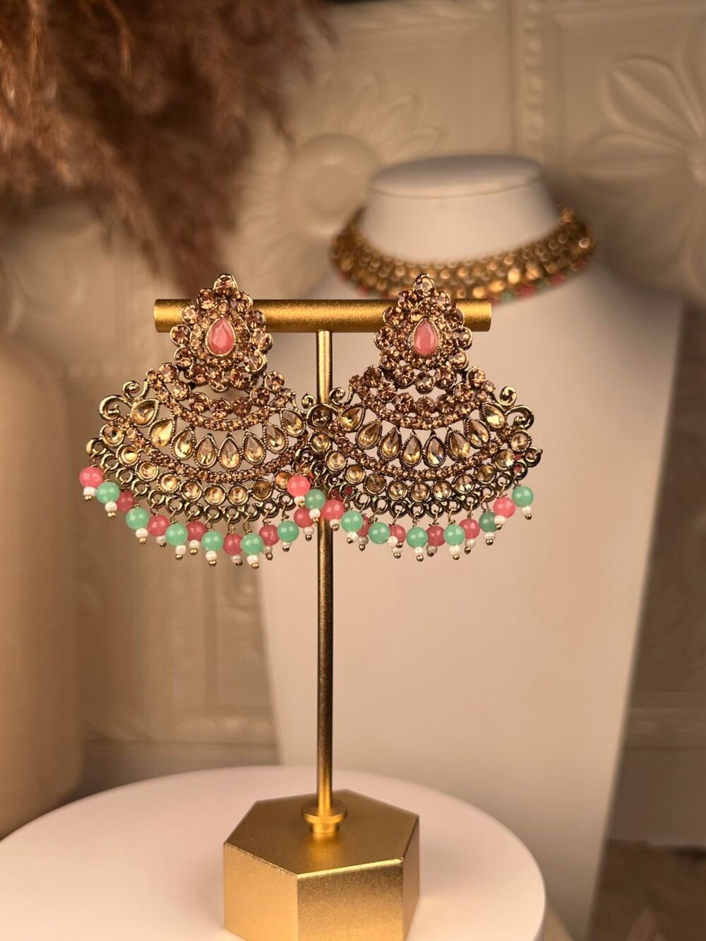 Gold & Pearl Polki Jhumkas – Multicolored – South Asian jewelry – Wedding accessory,Gold Polki Bridal Necklace Set – Multicolored – South Asian jewelry – Top view, Kundan Polki Necklace with Earrings – Multicolored – South Asian jewelry – Side angle, Rose Gold Earrings – South Asian jewelry – Traditional design Rose Gold Earrings – South Asian jewelry – Close-up angle