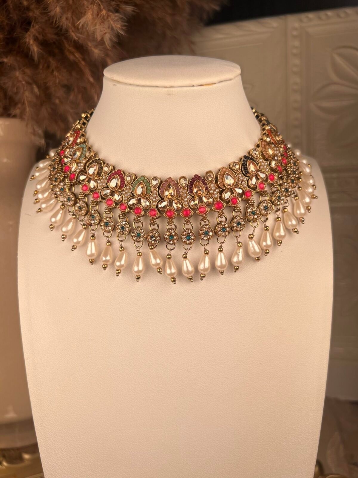 Gold & Pearl Polki Jhumkas – Multicolored – South Asian jewelry – Wedding accessory,Gold Polki Bridal Necklace Set – Multicolored – South Asian jewelry – Top view, Kundan Polki Necklace with Earrings – Multicolored – South Asian jewelry – Side angle, Rose Gold Earrings – South Asian jewelry – Traditional design Rose Gold Earrings – South Asian jewelry – Close-up angle