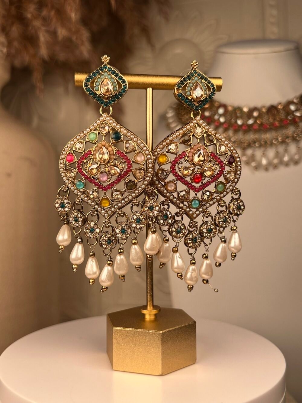 Gold & Pearl Polki Jhumkas – Multicolored – South Asian jewelry – Wedding accessory,Gold Polki Bridal Necklace Set – Multicolored – South Asian jewelry – Top view, Kundan Polki Necklace with Earrings – Multicolored – South Asian jewelry – Side angle, Rose Gold Earrings – South Asian jewelry – Traditional design Rose Gold Earrings – South Asian jewelry – Close-up angle