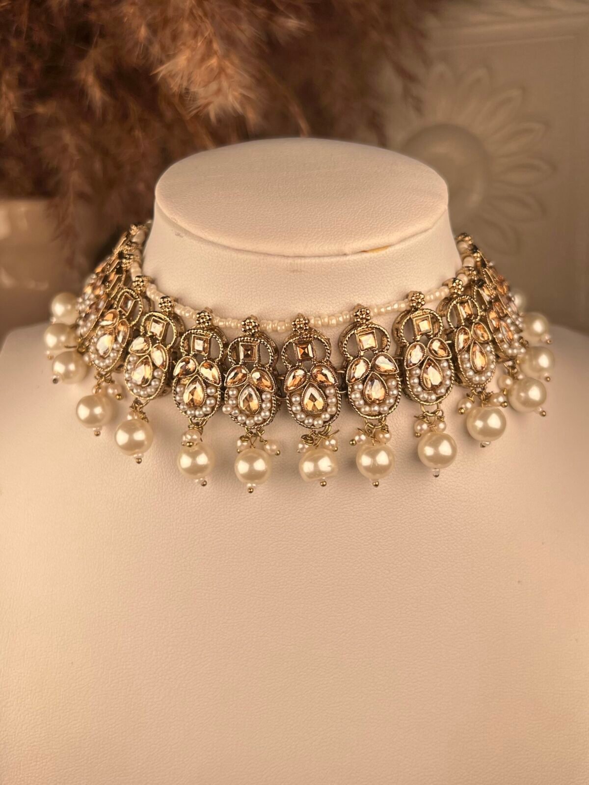 Gold & Pearl Polki Jhumkas – Multicolored – South Asian jewelry – Wedding accessory,Gold Polki Bridal Necklace Set – Multicolored – South Asian jewelry – Top view, Kundan Polki Necklace with Earrings – Multicolored – South Asian jewelry – Side angle, Rose Gold Earrings – South Asian jewelry – Traditional design Rose Gold Earrings – South Asian jewelry – Close-up angle