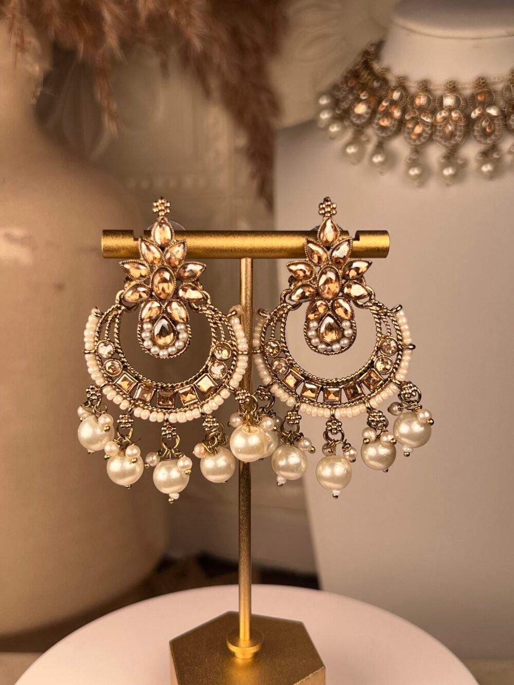 Gold & Pearl Polki Jhumkas – Multicolored – South Asian jewelry – Wedding accessory,Gold Polki Bridal Necklace Set – Multicolored – South Asian jewelry – Top view, Kundan Polki Necklace with Earrings – Multicolored – South Asian jewelry – Side angle, Rose Gold Earrings – South Asian jewelry – Traditional design Rose Gold Earrings – South Asian jewelry – Close-up angle